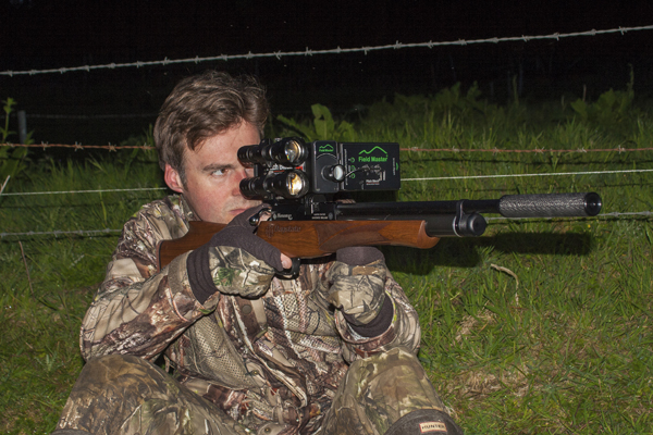 Using night vision to cut through the veil of darkness, Mat takes aim at another rabbit during his graveyard shift